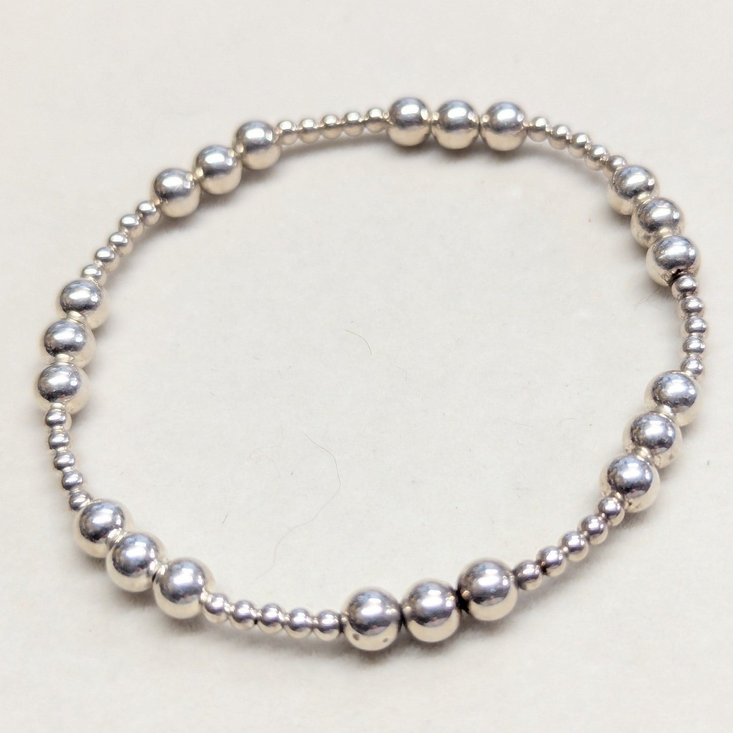 New Beaded Stretch Bracelet Silver Tone Graduated Round Beads Metal Stackable